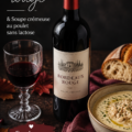 Bouteille de Bordeaux rouge avec un bol de soupe crémeuse au poulet
