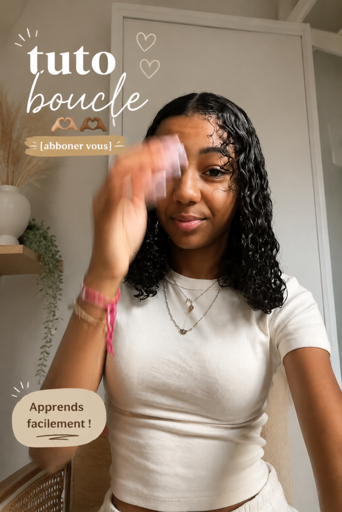 Femme réalisant des boucles dans un cadre lumineux, avec un fer à friser