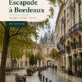 Vue du port de la Lune à Bordeaux avec des couleurs chaleureuses en arrière-plan.